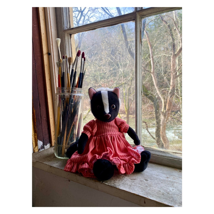 Lucy Skunk Plush